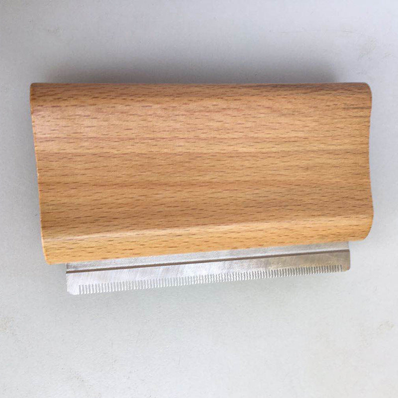 pet hair remover for horses with sturdy beech wood handle for effective grooming and fur care.